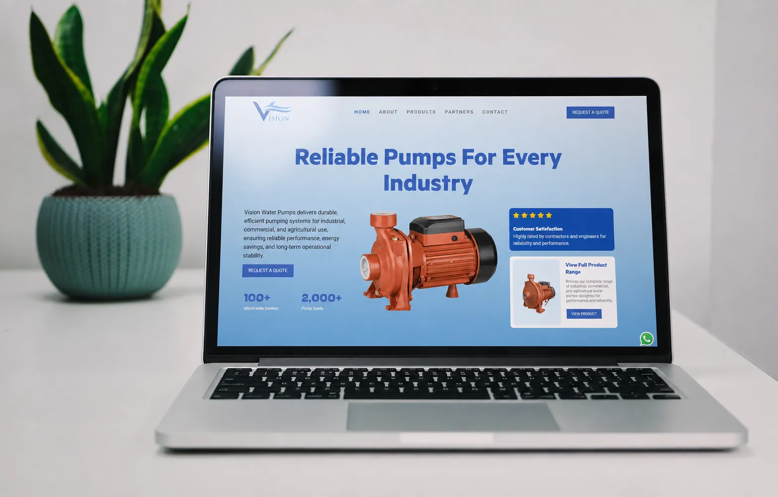 Vision Water Pumps product website preview on a laptop